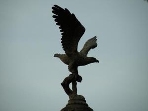 Primary view of object titled '[Eagle statue on lamp post]'.