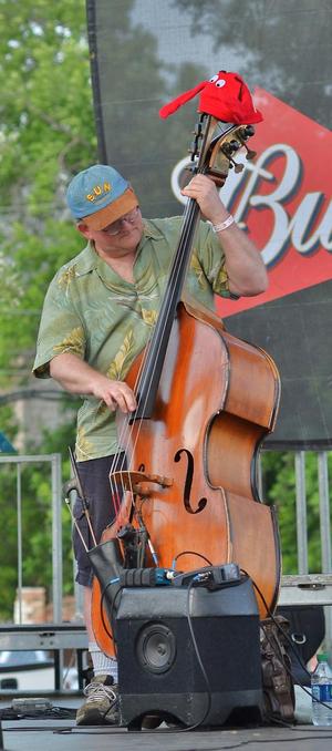 Primary view of object titled '[Man plays double bass at Denton Arts and Jazz Festival 2012]'.