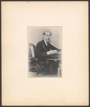Primary view of object titled '[Charles Dickens writing at a desk]'.