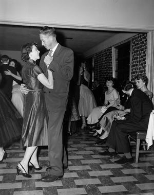Primary view of object titled '[Couple dancing at the TCU Lambda Chi Alpha Dance]'.