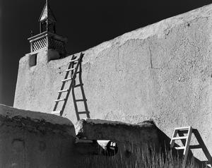 Primary view of object titled '[Abandoned adobe church with ladders]'.
