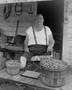 Photograph: [WWII vet selling pecans]