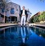 Photograph: [Mike Modano standing in a shallow pool]