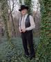 Photograph: [An older gentleman wearing western attire]