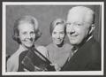 Primary view of [John S. Justin Jr. holding an award with wife Jane Justin and another woman]