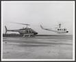 Photograph: [Two helicopters at the grand opening of Leonard's]
