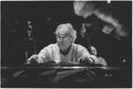 Photograph: [Dave Brubeck sits at piano, 2]
