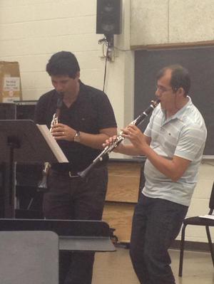 Primary view of object titled '[Ricardo Fraire and Johnson Machado perform at pre-concert event, 2]'.
