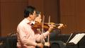 Photograph: [Weigang Li and Yi-Wen Jiang perform with Shanghai Quartet]