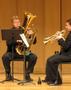 Photograph: [Jesse Orth and Richard Adams perform "Music for Brass Instruments"]