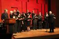 Photograph: [Mixed choir performs "Die Brücke" from "Zwei Parabeln nach Franz Kaf…