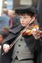 Photograph: [Young violin player at festival]