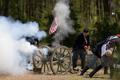 Photograph: [Thunderous Echoes: Cannon Ignition at Civil War Re-enactment, Pratt …