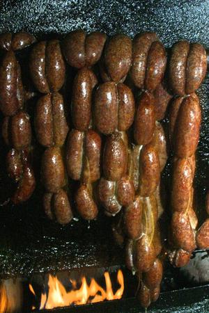 Primary view of object titled '[Savor the Sassafras Smoked Hot Links at Pittsburg Hot Link Restaurant]'.