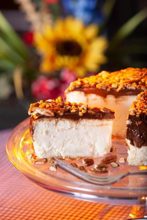 Primary view of object titled '[A Sweet Symphony: Walnut Topped Cheesecake in Athens, Texas]'.