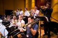 Photograph: [One O'Clock Lab Band brass section performs at the 15th World Saxoph…