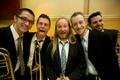 Photograph: [One O'Clock Lab Band trombone section at the 15th World Saxophone Co…
