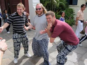 Primary view of object titled '[Chris Mike, Dave Richards, and Luke Brimhall in Thailand]'.