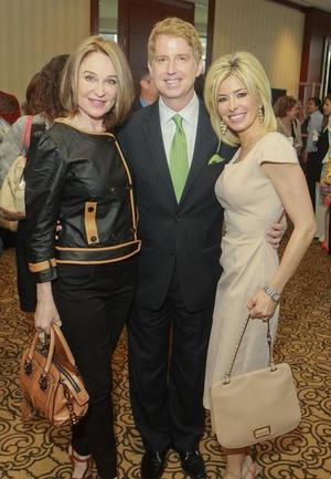 Primary view of object titled '[Becca Thrash, Lance Morgan and Nancy Marcus Golden at Children's Assessment Center Luncheon]'.