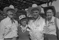 Photograph: [Four people at the Terlingua Chili Cook-Off, 2]