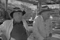Thumbnail image of item number 1 in: '[Two older men at the Terlingua Chili Cook-Off, 1]'.