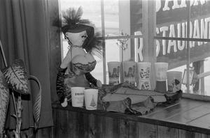 Primary view of object titled '[A female doll at the home of Willard Watson, "The Texas Kid", 1]'.