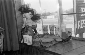 Primary view of object titled '[A female doll at the home of Willard Watson, "The Texas Kid", 3]'.
