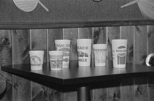 Primary view of object titled '[Cups on a table at the home of Willard Watson, "The Texas Kid", 2]'.