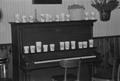 Thumbnail image of item number 1 in: '[Cups on a piano at the home of Willard Watson, "The Texas Kid", 5]'.