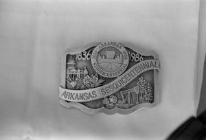 Primary view of object titled '[Belt buckle at the home of Willard Watson, "The Texas Kid"]'.