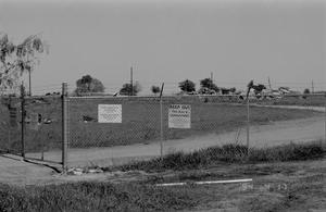 Primary view of object titled '[A view of the Branch Davidian Compound, fenced-off, 2]'.