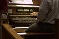 Photograph: [A Man Playing the Organ]
