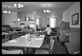 Photograph: [Man in an empty diner]