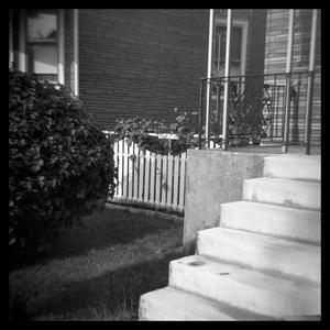 Primary view of object titled '[Picket fence between two homes]'.