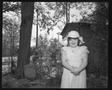Photograph: [Child in a white outfit]