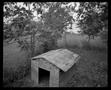 Photograph: [Empty dog house]