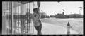 Photograph: [Jefferson Blvd Panoramic Man Looks over his Shoulder, 1988]