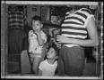 Photograph: [Woman and Two Kids, 1988]
