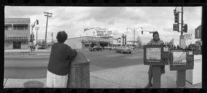 Primary view of object titled '[Jefferson Blvd Panoramic News Boxes Two Figures, 1988]'.