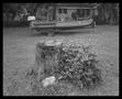 Photograph: [Boat and Pile Backyard, 1991]