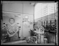 Photograph: [Lady in Thrift Store Jefferson Tower, 1993]