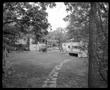 Photograph: [Yard with Stone Path Camper Top, 1985]