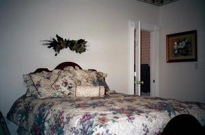 Primary view of object titled '[A bedroom at the Country Place at Cross Roads, 2]'.