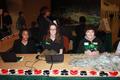 Photograph: [UNT Staff Working at Event Table with Name Tags]