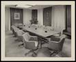 Photograph: [A conference room with swivel chairs]