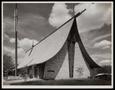 Photograph: [Exterior of a church with a curved roof]