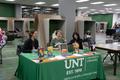 Primary view of [UNT library staff and faculty laughing together]