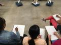 Photograph: [Students learning about fashion illustration]