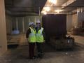 Thumbnail image of item number 1 in: '[Janelle McCabe and Becker standing in a construction zone]'.