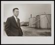 Photograph: [Man in a Suit in an Oil Field]